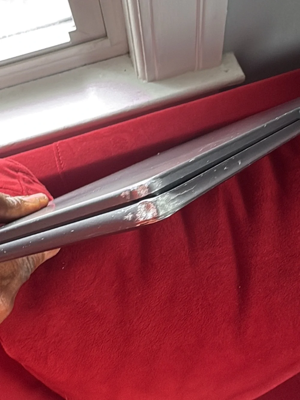 Lenovo Silver Laptop with Visible Corner Damage